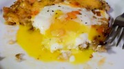 Cheesy Hashbrowns with Baked Egg - Yolk Broken
